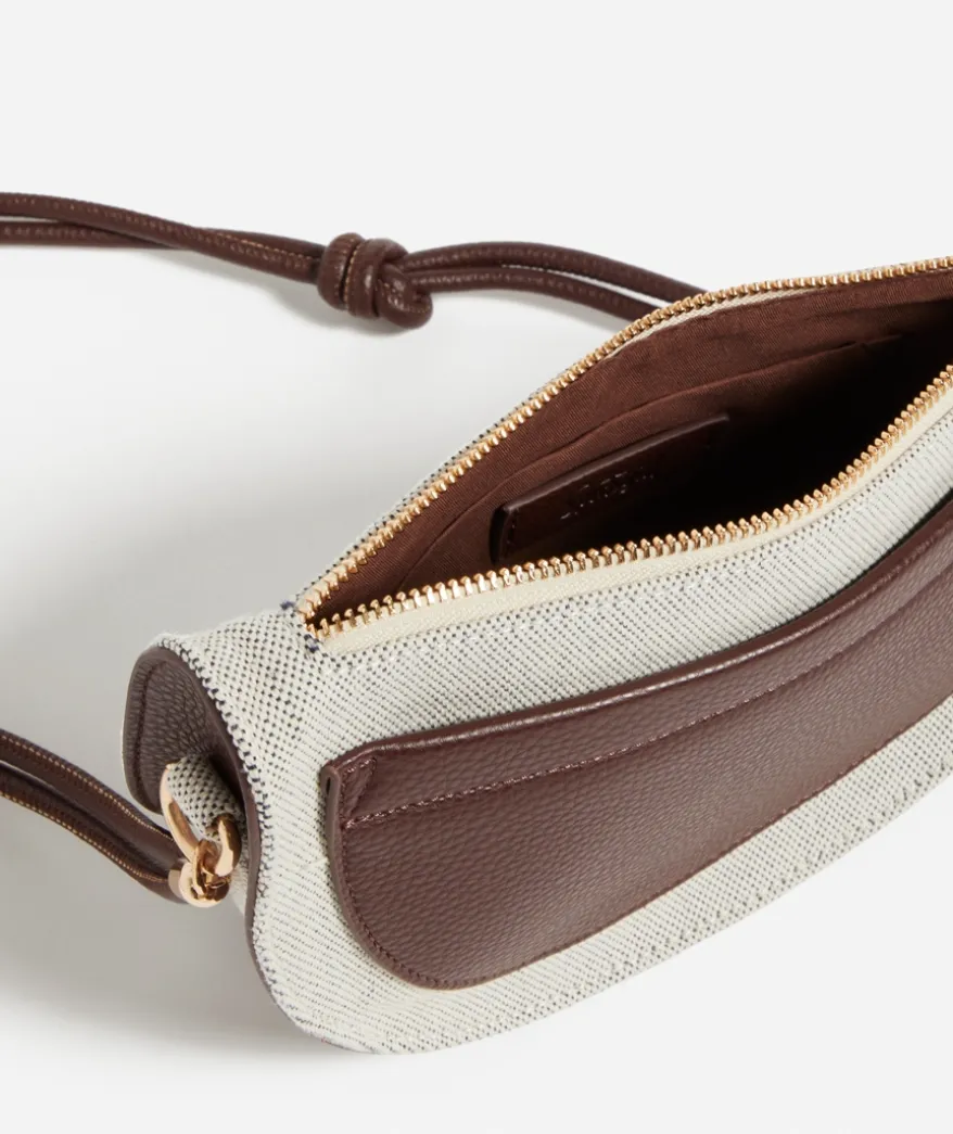 CORY CURVE SLING BAG
